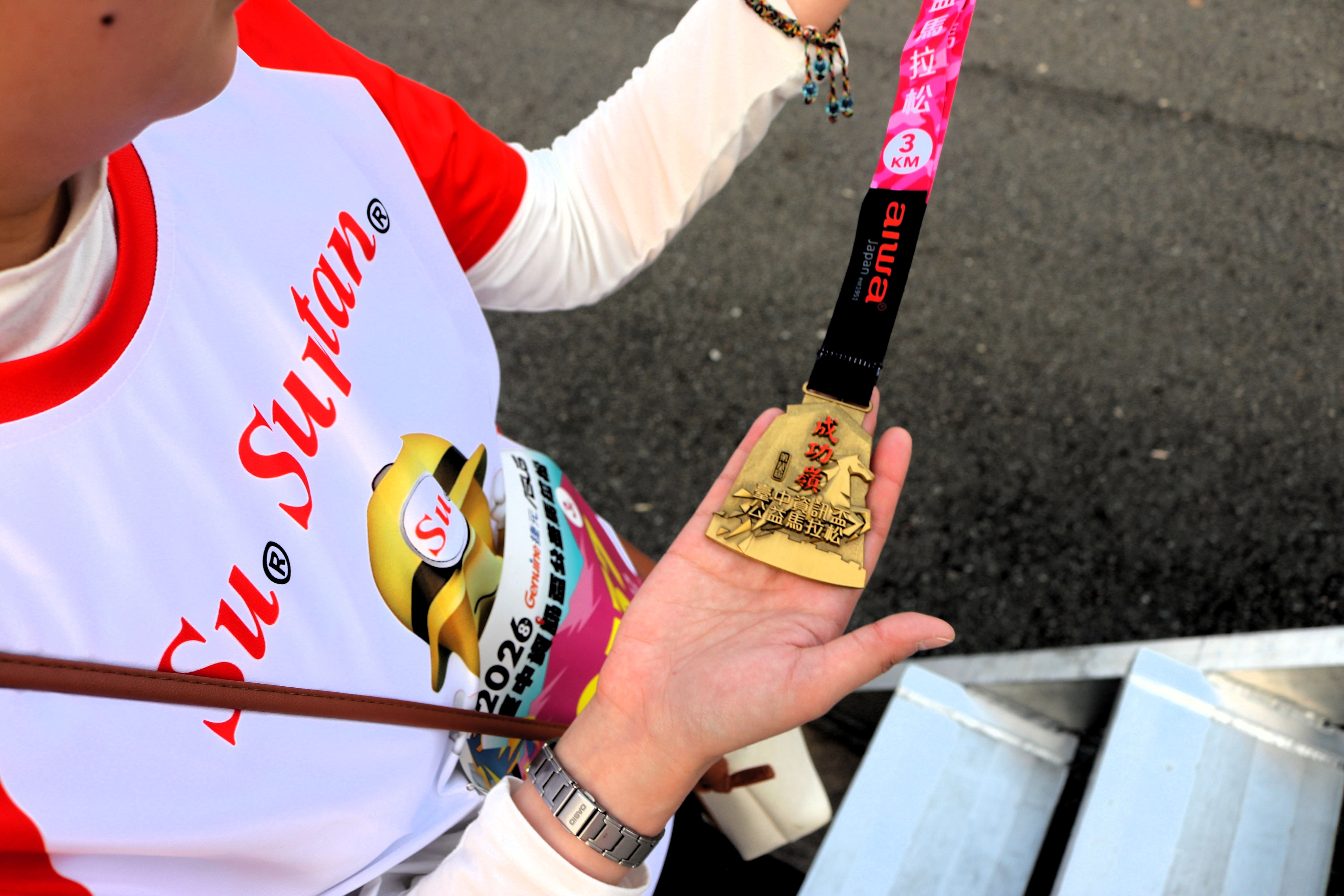 Suntan employee charity marathon finisher medal