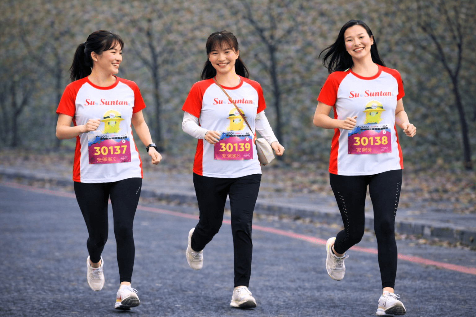 Suntan employees running charity marathon team spirit